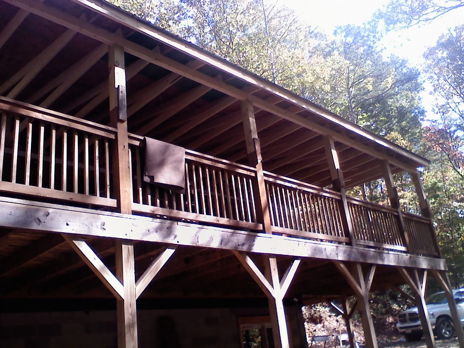 Timber framing under a new elevated porch and deck — Roof Leak Repair in Greenfield by Roofing Brothers